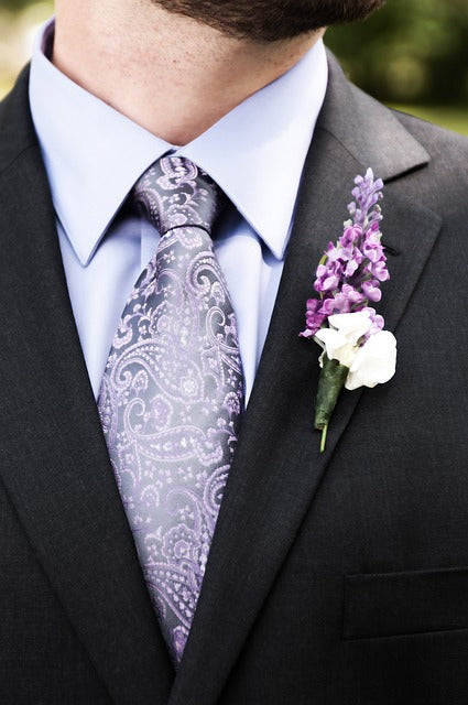 Why Do Suit Jackets Have Buttonholes in the Lapels?
