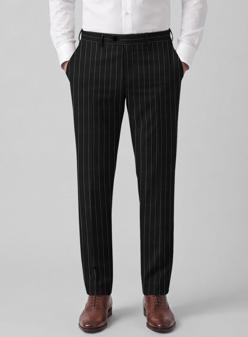 Front view of black rope stripe wool trousers on a model with white shirt and brown shoes