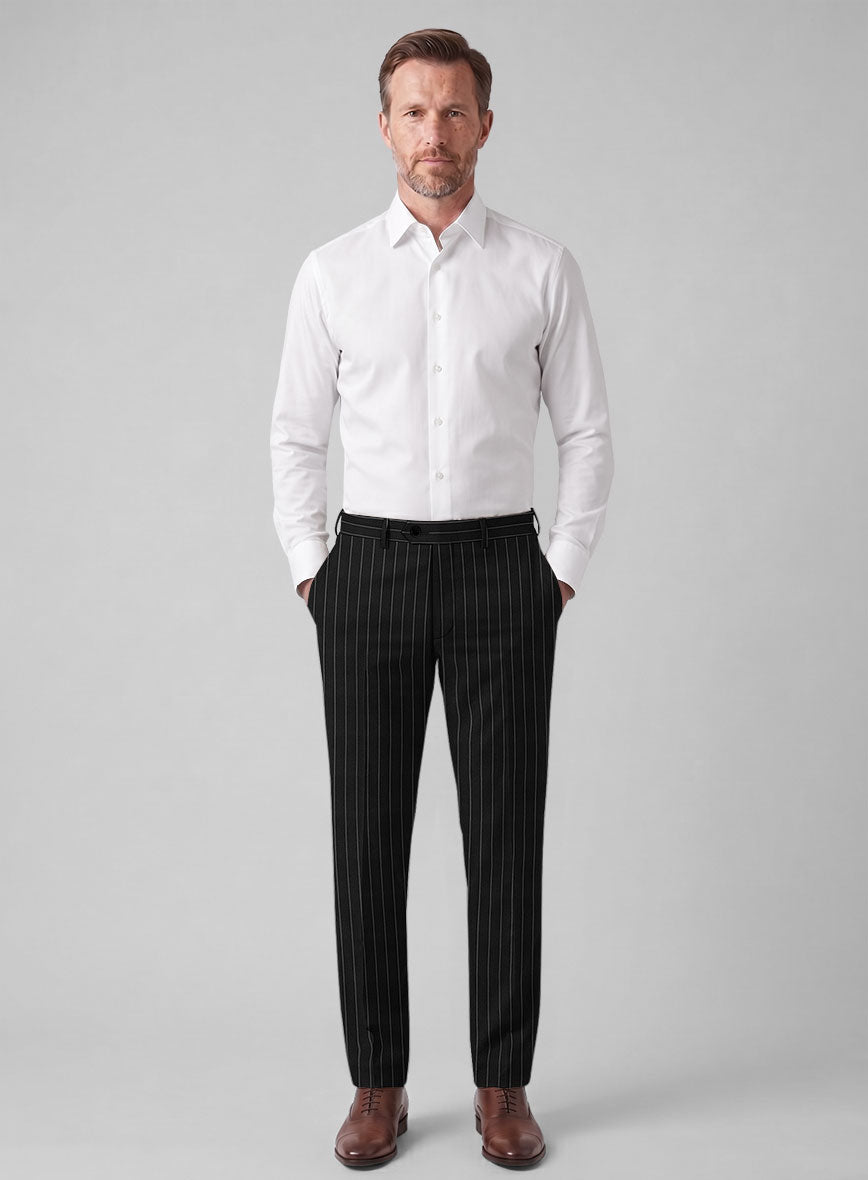 Full-length view of a man wearing black rope stripe wool trousers with a white shirt