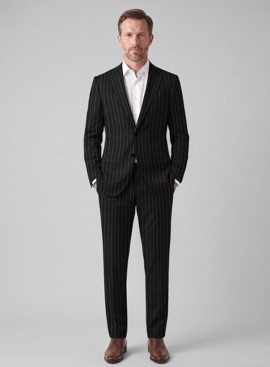 Man wearing a black rope stripe wool suit with white shirt, full-length front view