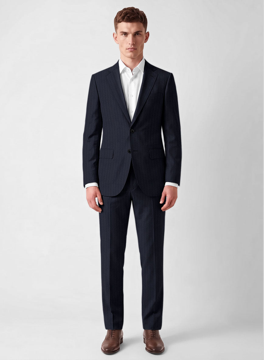 Man wearing a navy blue herringbone wool two-piece suit, full-length front view