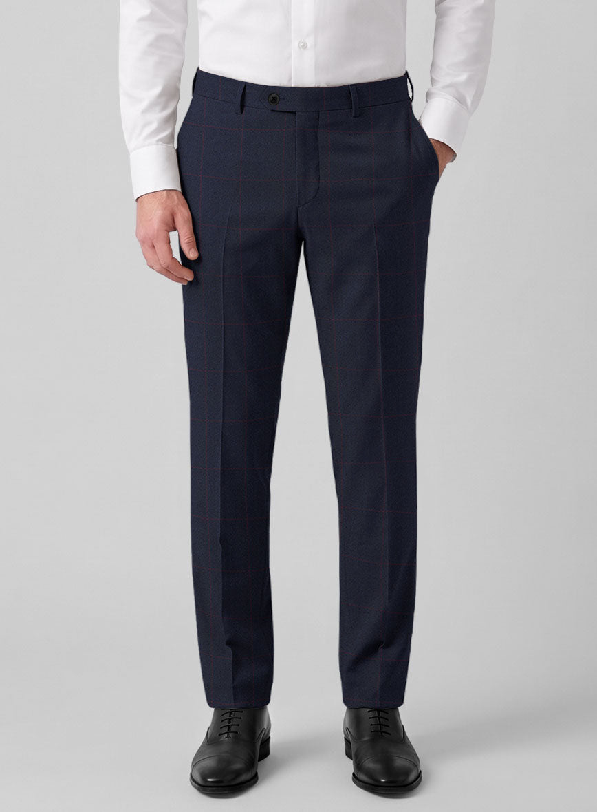 Navy blue windowpane wool trousers worn with a white shirt and black lace-up shoes, front view