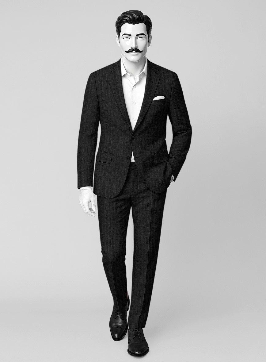 Black herringbone wool suit with pocket square on a mannequin, full-length front view
