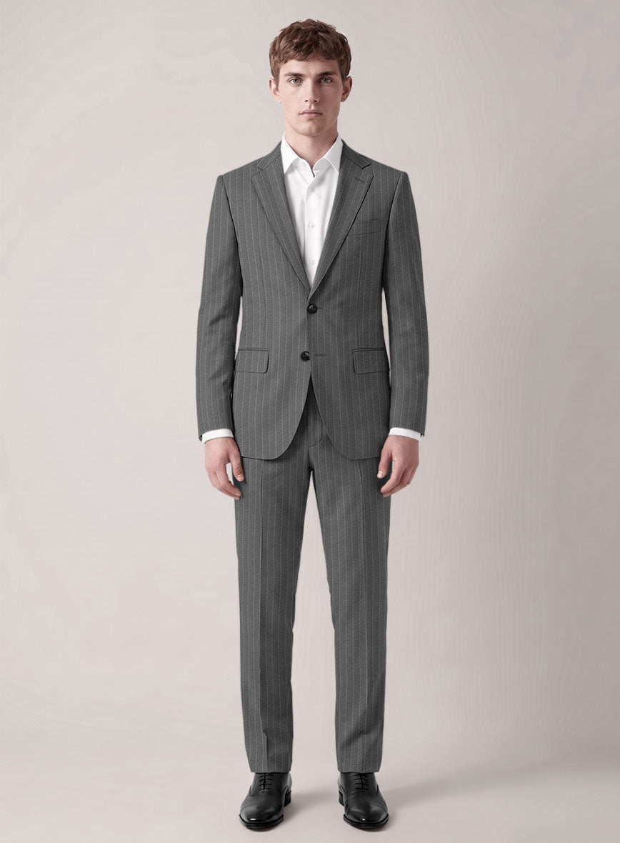 Man wearing a grey pinstripe two-button wool suit with white shirt and black oxford shoes