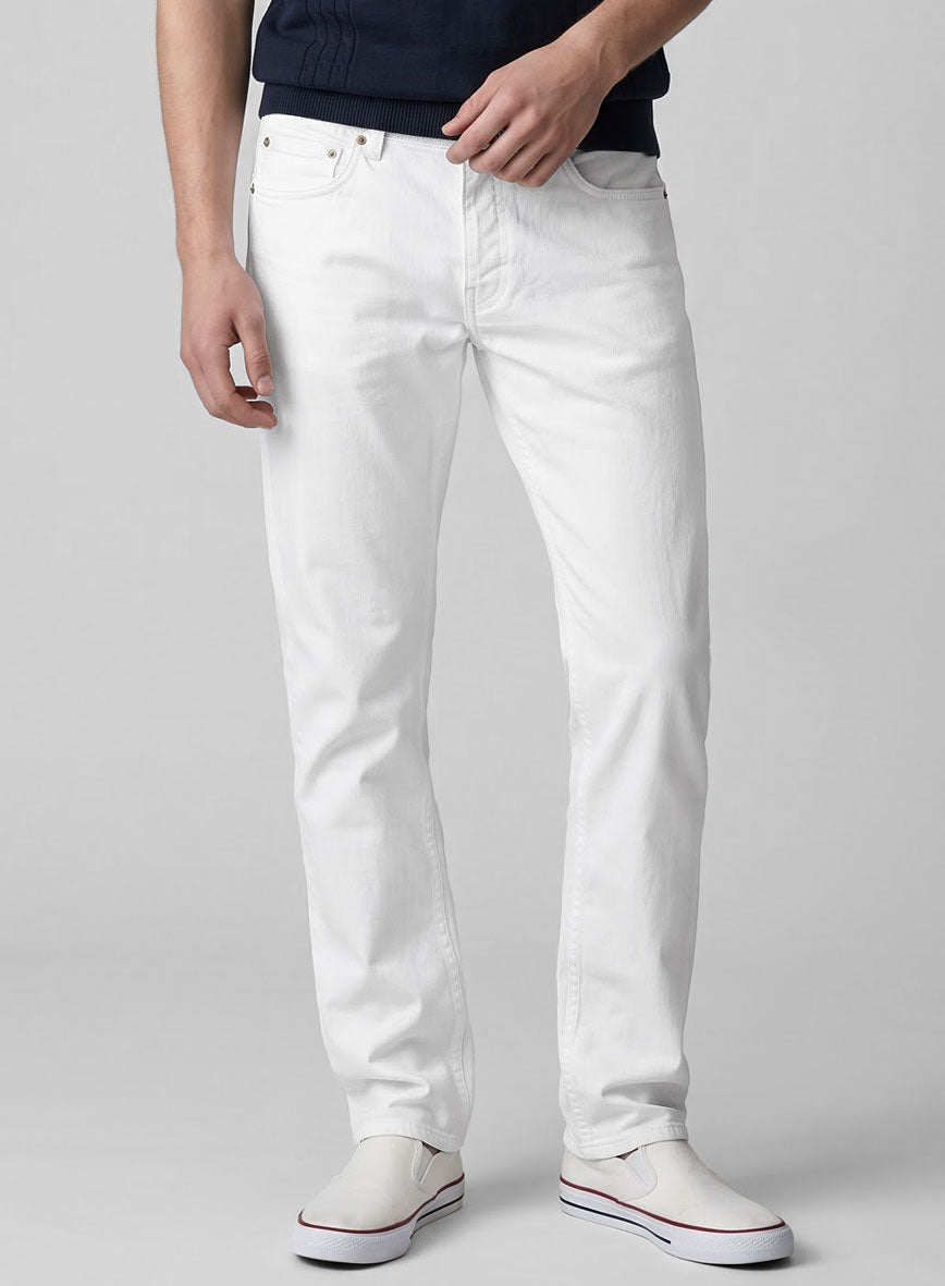 Front view of white stretch chino jeans with five-pocket styling on a model